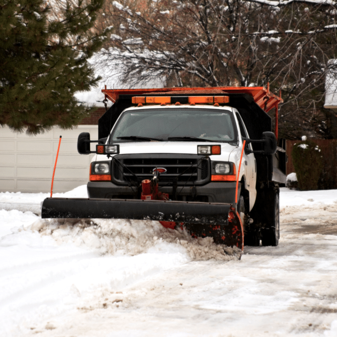 Snow Removal & Salting in Fraser Valley crew clearing a commercial walkway before the morning rush